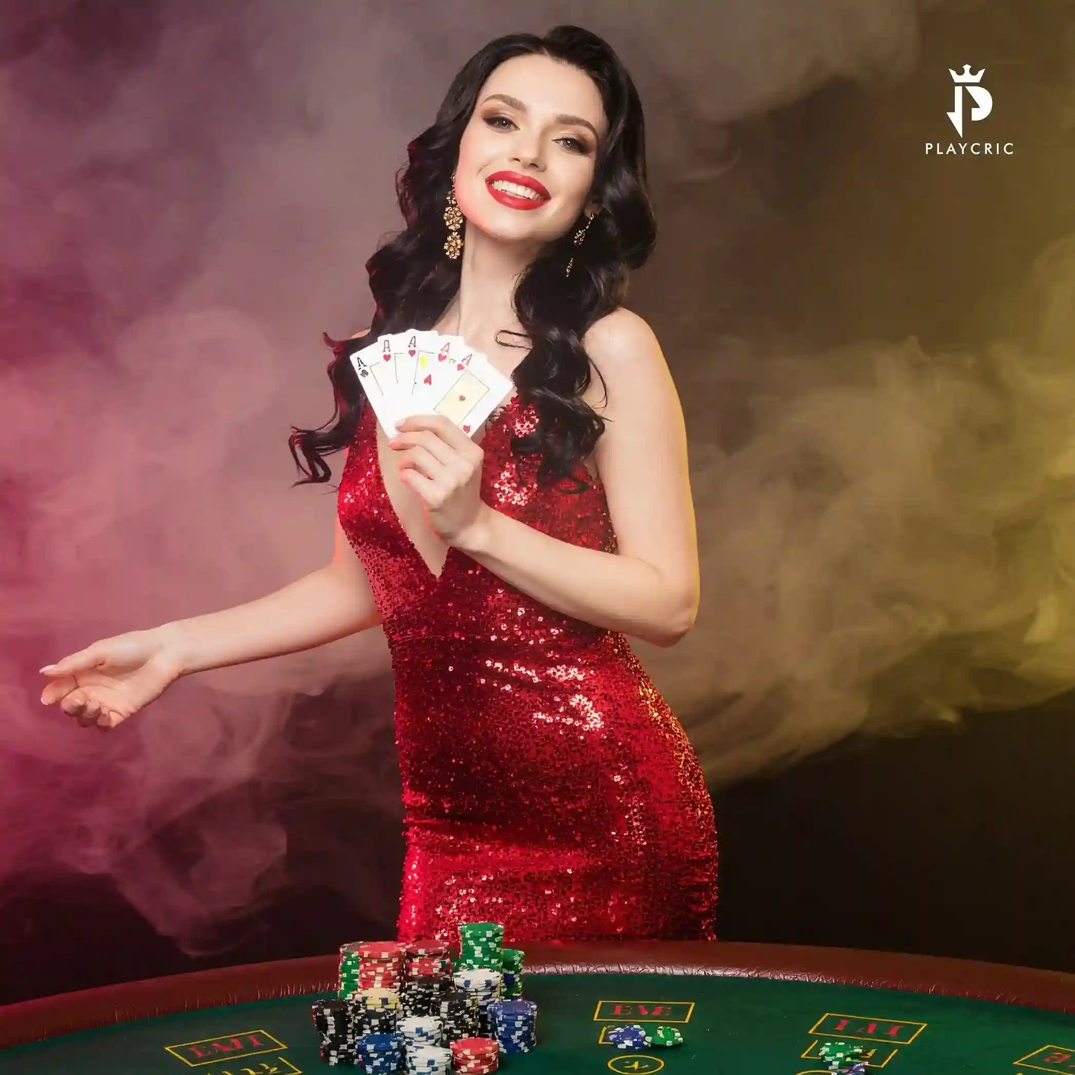 A woman in a red dress holding four aces at a Playcric table with colorful smoke.